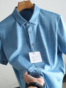 เสื้อเชิ้ตแขนสั้นผู้ชายลายสก็อตผ้าไหมและผ้าฝ้ายเนื้อนุ่มระบายอากาศได้ดี ทรงหลวม ฤดูร้อน 2024 ผ้าฝ้ายเนื้อนุ่ม