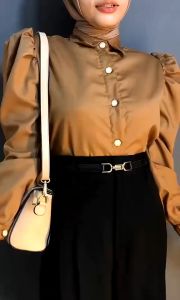 Bella Puffy Shirt Atasan Kemeja Puffy Wanita Lengan Panjang Terbaru\\n\\n Apa Itu Atasan Kemeja Puffy Terbaru?\\n\\nAtasan Kemeja Puffy Terbaru adalah salah satu tren mode pakaian yang sedang populer di kalangan wanita. Kemeja puffy memiliki desain yang unik dan menarik, dengan bagian bahu dan lengan yang dipadatkan atau \"puff\" yang memberikan tampilan yang lebih feminin dan elegan. Kemeja puffy wanita lengan panjang merupakan pilihan yang sempurna untuk acara formal atau semi-formal.\\n\\n Kemeja Puffy Desain Modern\\n\\nDesain modern dari kemeja puffy wanita lengan panjang menampilkan berbagai elemen yang menjadikannya pilihan yang ideal untuk setiap wanita. Mulai dari model dengan kerah berbentuk V atau kerah standar, hingga aksen ruffles atau pleats pada bagian lengan dan bahu. Desain modern ini menawarkan fleksibilitas bagi Anda untuk memadukan kemeja puffy dengan berbagai gaya pakaian.\\n\\n Kemeja Puffy Wanita Lengan Panjang\\n\\nKemeja puffy wanita lengan panjang adalah pilihan yang sempurna untuk Anda yang mencari kenyamanan dan tampilan yang modis. Lengan panjang ini memberikan perlindungan tambahan dari sinar matahari dan angin, sementara desain puffy pada bagian bahu dan lengan memberikan sentuhan feminin dan elegan.\\n\\n Kemeja Puffy untuk Acara Formal\\n\\nKemeja puffy wanita lengan panjang dapat menjadi pilihan yang ideal untuk acara formal atau semi-formal. Desain modern dan elegan dari kemeja puffy membuatnya cocok untuk dipakai di berbagai acara, mulai dari acara pernikahan, gala dinner, hingga acara bisnis formal.\\n\\n Bahan Nyaman untuk Kemeja Puffy\\n\\nBahan yang digunakan dalam pembuatan kemeja puffy wanita lengan panjang sangat penting untuk menjamin kenyamanan dan tampilan yang modis. Bahan-bahan seperti katun, sutra, dan poliester merupakan pilihan yang baik untuk kemeja puffy, karena memberikan kenyamanan dan daya tarik visual yang luar biasa.\\n\\n Cara Memilih Kemeja Puffy yang Tepat\\n\\nUntuk memilih kemeja puffy wanita lengan panjang yang tepat, pertimbangkan beberapa hal berikut:\\n\\n- **Ukuran**: Pastikan Anda memilih ukuran yang sesuai dengan tubuh Anda. Ukuran yang terlalu ketat atau terlalu longgar dapat mengganggu penampilan Anda.\\n- **Warna**: Pilih warna yang sesuai dengan acara dan gaya pakaian Anda. Warna netral seperti hitam, putih, dan abu-abu adalah pilihan yang aman, sementara warna-warna cerah dapat menambah kesan ceria dan energik.\\n- **Desain**: Pilih desain yang sesuai dengan gaya Anda. Jika Anda menyukai tampilan yang lebih feminin, pilih kemeja puffy dengan ruffles atau pleats pada bagian lengan dan bahu.\\n\\n Cara Menyimpan dan Merawat Kemeja Puffy\\n\\nUntuk menjaga kemeja puffy wanita lengan panjang tetap dalam kondisi prima, penting untuk merawat dan menyimpannya dengan benar.\\n\\n Tips Merawat Kemeja Puffy dengan Benar\\n\\nBerikut adalah beberapa tips merawat kemeja puffy dengan benar:\\n\\n- **Cuci dengan tangan**: Jika memungkinkan, cuci kemeja puffy dengan tangan menggunakan deterjen yang lembut dan air dingin.\\n- **Jemur di tempat teduh**: Setelah dicuci, jemur kemeja puffy di tempat teduh agar tidak terkena sinar matahari langsung yang dapat merusak warna dan tekstur kain.\\n- **Lipat dengan hati-hati**: Lipat kemeja puffy dengan hati-hati agar tidak merusak bentuk dan desainnya.\\n\\n Cara Mencuci Kemeja Puffy dengan Aman\\n\\nBerikut adalah langkah-langkah mencuci kemeja puffy dengan aman:\\n\\n1. Cuci kemeja puffy dengan tangan menggunakan deterjen yang lembut dan air dingin.\\n2. Bilas kemeja puffy dengan air bersih hingga sisa deterjen hilang.\\n3. Jemur kemeja puffy di tempat teduh agar tidak terkena sinar matahari langsung.\\n\\n Kesimpulan\\n\\nBella Puffy Shirt Atasan Kemeja Puffy Wanita Lengan Panjang Terbaru adalah pilihan yang sempurna untuk setiap wanita yang mencari kenyamanan dan tampilan yang modis. Dengan desain modern dan elegan, kemeja puffy wanita lengan panjang dapat dipadukan dengan berbagai gaya pakaian dan cocok untuk acara formal atau semi-formal. Pastikan untuk merawat dan menyimpan kemeja puffy dengan benar agar tetap dalam kondisi prima.\\n\\n Manfaat Memiliki Bella Puffy Shirt Atasan Kemeja Puffy Wanita Lengan Panjang Terbaru\\n\\nMemiliki Bella Puffy Shirt Atasan Kemeja Puffy Wanita Lengan Panjang Terbaru memiliki beberapa manfaat, antara lain:\\n\\n- **Kenyamanan**: Kemeja puffy wanita lengan panjang memberikan kenyamanan ekstra saat dipakai.\\n- **Tampilan modis**: Desain modern dan elegan dari kemeja puffy membuat Anda tampil modis di berbagai acara.\\n- **Versatilitas**: Kemeja puffy dapat dipadukan dengan berbagai gaya pakaian, menjadikannya pilihan yang ideal untuk setiap wanita.\\n\"\n}