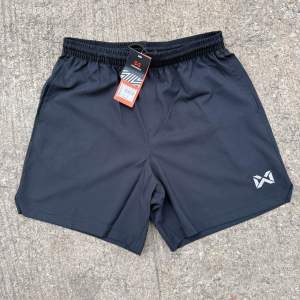 Warrix กางเกงฟุตบอล/กางเกงแบตมินตัน/กางเกงลำลอง มีกระเป๋า ขาสั้น รุ่น Power Stride Shorts WP-241FBACL02 ใส่สบาย ระบายอากาศได้ดี สำหรับผู้เล่นกีฬาทุกประเภท