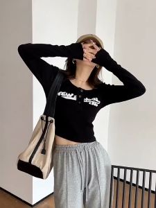 Kemeja berkancing leher rendah pola monogram lengan panjang musim panas Korea wanita