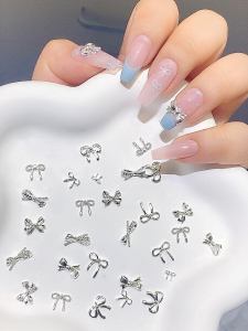 50pcs Mixed Alloy Butterfly Knot 3D Nail Decorations Popular Beauty Tools from China Normal Size Basic Packaged Nail Art Supplies