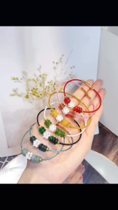 Vòng tay đá phong thuỷ ngũ đồng điếu mix với charm sen bằng bạc ST0201
