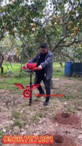 Máy khoan đất trồng trụ rào  đóng cọc bê tông giá rẻ
