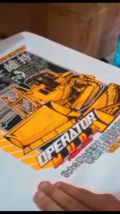 Kaos OPERATOR MUDA TERBARU OPERATOR BULLDOZER NEVER ENDING IN INNOVATION Baju By Triple A Distro