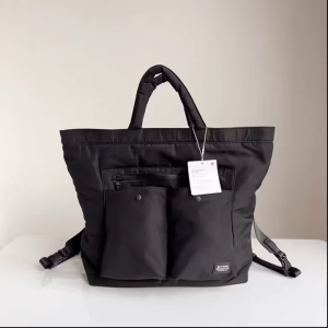 Multiple carrying methods are available for both men and women. Features include hand-held cross-body and backpack styles. The large capacity design can accommodate a 16-inch laptop. The multi-pocket design with a luggage bag cover is made of shock-re