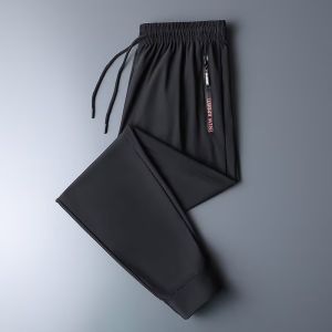 กางเกงขายาวทรงตรงหลวมๆ ผ้าไหมน้ำแข็งบางๆ สำหรับใส่ไปทำงาน กางเกงขายาวทรงตรงมีกระเป๋าและซิป ทรงหลวมๆ สำหรับใส่ไปทำงาน