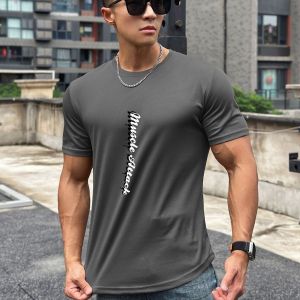 เสื้อยืดคอกลมแขนสั้นทรงสลิมฟิตสไตล์อเมริกันสำหรับผู้ชาย ทรงลำลอง แห้งเร็ว ผ้าผสมโพลีเอสเตอร์ คอกลม สำหรับออกกำลังกาย