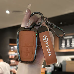 เปลือกเคสหุ้มกุญแจรถสำหรับ Toyota คอโรลล่าอัลติส RAV 4 Camry Cross Leather โลหะผสมอุปกรณ์เสริมรถยนต์การป้องกันที่ครอบคลุม