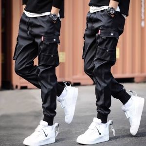 2025 New Trendy Solid Color Pants Multi Flap Pocket Mens Cargo Pants Loose Casual Outdoor Pants Mens Work Pants oversized