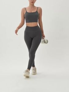 Bộ Đồ Tập Yoga Nữ Cao Cấp Áo Ngực Thể Thao Liền Mạch Chống Sốc Và Quần Cạp Cao Thiết Kế Ôm Sát Tôn Dáng Mông Đào.