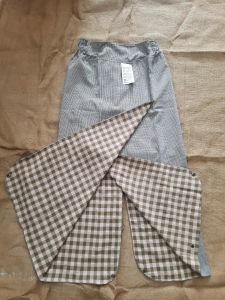Váy Chống Nắng xẻ tà 2 lớp 2 mặt vải có nút bấm dưới chân mặc được 3 kiểu ngồi sau thoải mái an toàn.