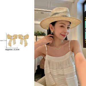CAFFTI | Gold Silver Lace Diamond CZ Bow Earrings