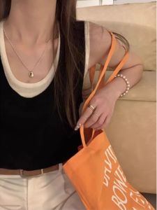 เสื้อกั๊กสั้นแขนกุดสีดำสำหรับผู้หญิงในช่วงฤดูร้อน ทรงเข้ารูป แขนกุด ดีไซน์เก๋ไก๋ ใส่ได้หลากหลายโอกาส เสื้อผ้าทำงาน