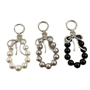 Korean style fashionable versatile keychain pendant metal irregular bow pearl bead mobile phone luggage hanging accessory