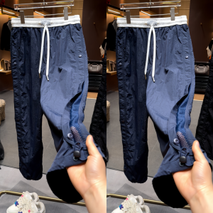 กางเกงวอร์มลำลองระบายอากาศได้ดี ทรงหลวม ทรงตรง ปิดด้วยกระดุม สีบล็อก กางเกงขายาวทรงสตรีทสไตล์สปริง/ซัมเมอร์