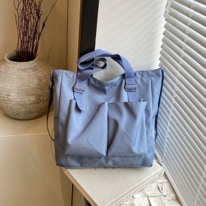 กระเป๋าผ้าใบสะพายข้างแบบสะพายข้างสำหรับผู้หญิง ความจุขนาดใหญ่ กระเป๋าสะพายไหล่เดี่ยวสำหรับการเดินทางไปทำงาน กระเป๋าใส่หนังสือสำหรับนักเรียน