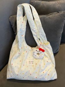 กระเป๋าผ้าใบปักลายดอกไม้สไตล์เกาหลีสำหรับผู้หญิง กระเป๋าถือทรงถุงบรรจุภัณฑ์ขนาดใหญ่สำหรับเดินทาง กระเป๋าสะพายไหล่ข้างเดียว กระเป๋าถือสำหรับนักเรียน