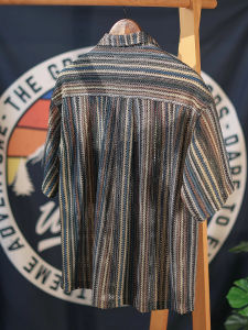 เสื้อเชิ้ตแขนสั้นผู้ชายสไตล์ใหม่ฤดูร้อนปี 2025 ทรงหลวม ระบายอากาศได้ดี เสื้อเชิ้ต Tagkita แบรนด์เสื้อผ้าผู้ชายที่สวมใส่สบาย