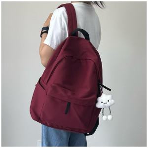 New solid-color youth travel backpack large-capacity college student schoolbag high-quality nylon material backpack simple design computer bag boys and girls both genders
