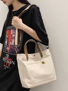 กระเป๋าผ้าใบแบบสะพายข้างสำหรับใส่ของใช้สำหรับนักเรียนวิทยาลัยแบบลำลองขนาดใหญ่ กระเป๋าสะพายข้างผ้าใบแบบยูนิเซ็กซ์ กระเป๋าถือแบบสะพายข้างแบบลำลอง