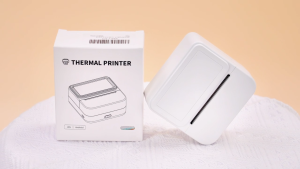 Máy In Nhiệt Mini Bluetooth cầm tay với giấy dán 1 cuộn Máy dán nhãn Y2C Máy in bỏ túi Bluetooth Thích hợp cho DIY Ghi chú Quà tặng hợp lý hình ảnh cho trẻ em và tay nghề thủ công Trắng