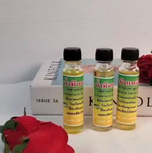 น้ำมันตะไคร้ น้ำมันตะไคร้หอม ใช้ทา แมลงสัตว์กัดต่อย นวดเมื่อ เหน็บชา ปวดเมื่อย น้ำมันสมุนไพร น้ำมันเหลือง