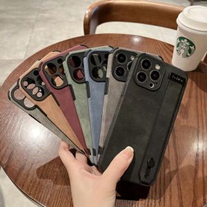 CrashStar Solid Color Fur Leather Soft Shockproof Phone Case With Wristband Holder For iPhone 16 15 14 13 12 11 Pro Max XS XR X 8 7 Plus + SE 2020 Anti-fall Phone Casing Cover With Full Cover Lens Camera Protection Hot Sale