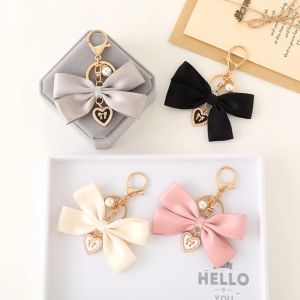 UUMIR Fabric Ribbon Bow Heart Pendant Keychain: A Versatile DIY Anti-Lost Charm