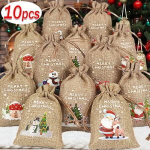 กระเป๋าพิมพ์ลายคริสต์ มาสผ้าลินินถุงขนมคุกกี้ แบบหูรูดสำหรับคริสมาสต์ปีใหม่ ปาร์ตี้ กระเป๋าเก็บของของขวัญ