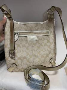 Like new authentic signature PVC sling bag