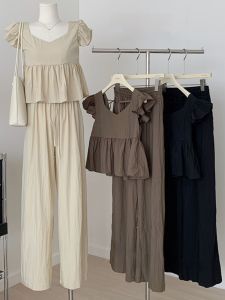 ชุดสองชิ้นสไตล์ฝรั่งเศสสำหรับผู้หญิงในช่วงฤดูร้อนปี 2025 ชุดทำงานลำลองสไตล์ใหม่พร้อมแขนกุดและกางเกงขากว้าง