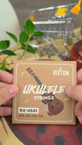 Rixton 4PCS/set High-Quality White Nylon Ukulele Strings with Free Guitar Pick - Universal Fit Durable & Sturdy