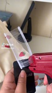 Súng bắn mác quần áo máy bấm nhãn mác quần áo