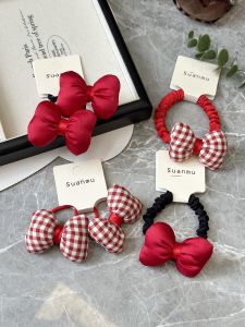 Children's Red Plaid Hair Ties: Soft & High-Elasticity Hair Bands for Girls\\n\\n Introduction to Children's Red Plaid Hair Ties\\n\\nChildren's red plaid hair ties are a stylish and practical accessory designed for girls, offering a perfect blend of fashion and functionality. These hair ties come in various styles and colors, making them suitable for different occasions and preferences. Soft cloth butterfly knot bands, in particular, have gained popularity due to their softness, comfort, and durability.\\n\\n What Are Children's Red Plaid Hair Ties?\\n\\nChildren's red plaid hair ties are made from high-quality materials that provide excellent elasticity and strength. They feature a plaid pattern with a vibrant red color, which adds a playful touch to any hairstyle. These hair ties come in pairs, making them ideal for gifting or using during special occasions.\\n\\n Why Choose Soft Cloth Butterfly Knot Bands?\\n\\nSoft cloth butterfly knot bands offer several advantages over traditional hair ties. They are gentle on hair, reducing the risk of breakage and damage. Moreover, they are comfortable to wear, even for extended periods, making them perfect for everyday use.\\n\\n Key Features of Children's Red Plaid Hair Ties\\n\\n High Elasticity & Durability\\n\\nThese hair ties are made from high-quality materials that provide excellent elasticity and durability. They can stretch up to 10 times their original length, making them suitable for various hair types and lengths. Additionally, they are resistant to wear and tear, ensuring a long-lasting product.\\n\\n Soft & Comfortable Design\\n\\nSoft cloth butterfly knot bands are designed to be gentle on hair, reducing the risk of breakage and damage. They are made from soft materials that provide a comfortable fit, even for extended periods. Moreover, they are easy to use, making them suitable for children of all ages.\\n\\n Variety of Styles & Colors\\n\\nChildren's red plaid hair ties come in various styles and colors, making them suitable for different occasions and preferences. They can be paired with other accessories, such as headbands or hair clips, to create a unique look. Moreover, they are available in different sizes, ensuring a perfect fit for every child.\\n\\n How to Use Children's Red Plaid Hair Ties\\n\\n Step-by-Step Guide to Using Hair Ties\\n\\nUsing children's red plaid hair ties is simple and straightforward. First, gather the hair into a ponytail or bun. Then, wrap the hair tie around the base of the ponytail or bun, securing it in place. Finally, adjust the hair tie to ensure a snug fit.\\n\\n Tips for Choosing the Right Size\\n\\nChoosing the right size of hair tie depends on the thickness and length of the hair. For thin or short hair, a smaller hair tie is recommended. For thick or long hair, a larger hair tie is more suitable. It is essential to choose the right size to ensure a secure and comfortable fit.\\n\\n How to Care for Your Hair Ties\\n\\nTo maintain the quality and longevity of children's red plaid hair ties, it is essential to care for them properly. They should be stored in a cool, dry place away from direct sunlight. Moreover, they should be washed gently using mild soap and water. It is recommended to air-dry the hair ties instead of using a dryer or iron.\\n\\n Benefits of Children's Red Plaid Hair Ties\\n\\n Enhance Your Child's Style\\n\\nChildren's red plaid hair ties can enhance your child's style by adding a playful touch to their hairstyle. They come in various styles and colors, making them suitable for different occasions and preferences. Moreover, they can be paired with other accessories to create a unique look.\\n\\n Keep Hair Neat & Tidy\\n\\nThese hair ties are designed to keep hair neat and tidy, reducing the risk of hair falling out of place during activities. They provide a secure and comfortable fit, ensuring that hair stays in place throughout the day.\\n\\n Perfect for New Year Celebrations\\n\\nChildren's red plaid hair ties are perfect for new year celebrations, adding a festive touch to any hairstyle. They are available in pairs, making them ideal for gifting or using during special occasions. Moreover, they come in various styles and colors, ensuring a perfect match for every outfit.\\n\\nIn conclusion, children's red plaid hair ties are a stylish and practical accessory designed for girls. They offer several advantages over traditional hair ties, including softness, comfort, and durability. Moreover, they come in various styles and colors, making them suitable for different occasions and preferences. With proper care, these hair ties can last for years, providing a reliable solution for keeping hair neat and tidy.\\n\\n[Keywords]: Children's Plaid Hair Ties, Girls Hair Ties Pair Pack, Soft Cloth Butterfly Knot Bands, New Year Hair Accessories, High Elasticity Hair Bands\n}