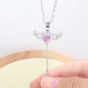 Ladamas Kalung Titanium Liontin Sayap Bidadari Bisa Bergerak Dengan Permata Berkilau KT103