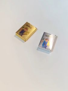 Kartu Pokemon Trading Card Emas Bahasa Inggris: Charizard Pikachu Pelatih