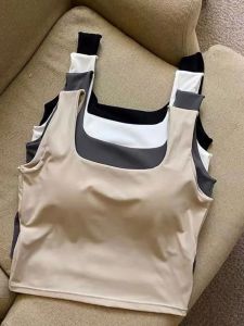 สไตล์สปอร์ต สั้น แขนกุด เสื้อกั๊ก ชั้นฐาน เสื้อกล้าม สตรีทสไตล์ สีทึบ ผู้หญิง แฟชั่น ฤดูใบไม้ร่วง ตัดตรง วัสดุอื่น ๆ