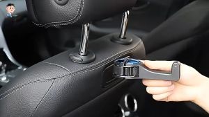 Multi-functional Car Headrest Hook An Automobile Interior Accessory That Can Be Used As A Mobile Phone Holder and A Hook for Hanging Items.