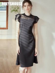 Đầm đen trơn cổ tròn kiểu phối lưới cứng dáng xoè nhẹ