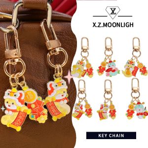 X.z. MOONLIGH ปีแห่งงูวัฒนธรรมและความคิดสร้างสรรค์จี้พวงกุญแจ DIY กระเป๋านักเรียนนักเรียนที่น่ารักจี้ปีของจี้กุญแจนำโชคชุดมาสคอตงู