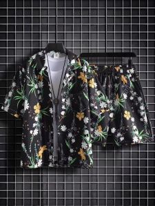 Casual Sporty ชุดสองชิ้นสําหรับชายหลวม Fit กางเกงขาสั้นชายหาดขนาดใหญ่รูปแบบพืชเสื้ออินเทรนด์คู่ทํางาน