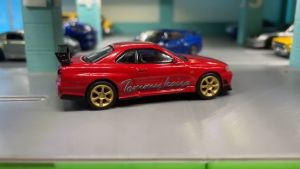 Mô hình xe Nissan Skyline GTR Tommykaira R-z 1:64 MiniGT