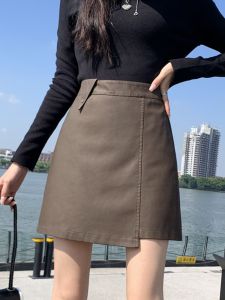 สูง เอว Pu หนัง กระโปรงสั้น ผู้หญิง ฤดูใบไม้ร่วง ฤดูหนาว 2023 ไม่สม่ําเสมอ กระโปรงทรงเอ พรางหุ่น Anti-light ซิป ชุดทํางาน