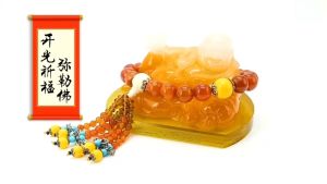 Tượng phật Di lặc Vàng ánh trắng đặt taplo ô tô tay cầm kim ngân