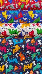 ผ้าเมตร ผ้าคอตต้อนญี่ปุ่นลายการ์ตูน ลายไดโนเสาร์ ผ้าคอตต้อน100% หน้ากว้าง 45 นิ้ว หน่วยขายเป็นเมตร