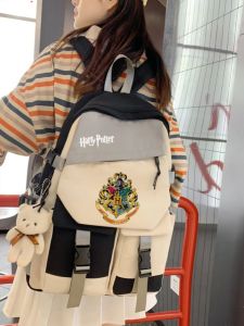 กระเป๋าเป้สะพายหลังผ้าแคนวาสลายการ์ตูน Harry Potter สำหรับนักเรียนมัธยมต้นและมัธยมปลาย กระเป๋าเดินทางแบบลำลองสำหรับเด็กชายและเด็กหญิง กระเป๋าเป้สะพายหลังแบบอเนกประสงค์