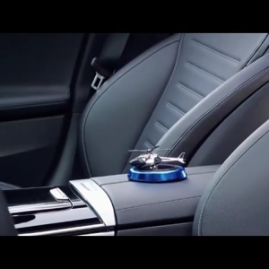 AIODIY Car Freshener Automotive essential oils No fire Interior solar energy aircraft ornament Ointment rotate Car Air Freshener