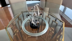 Celestial perpetual motion machine swinging device dynamic art home desktop and office decoration