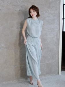 MIUCO | Áo Thun Tencel Dạng Muối Không Tay Cổ Tròn Nơ Buộc eo và Chân Váy Dài Xòe
