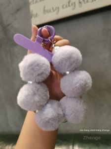 ZHENGEGE | Plush Fuzzy Pom-Pom Beaded Short Winter New Years Decorative Anti-theft Phone Lanyard Wrist Strap